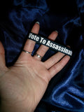 “I VOTE TO ASSASSINATE POLITICIANS” navy wristband